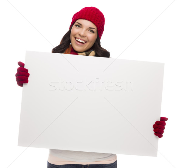 Excited Girl Wearing Winter Hat and Gloves Holds Blank Sign  Stock photo © feverpitch