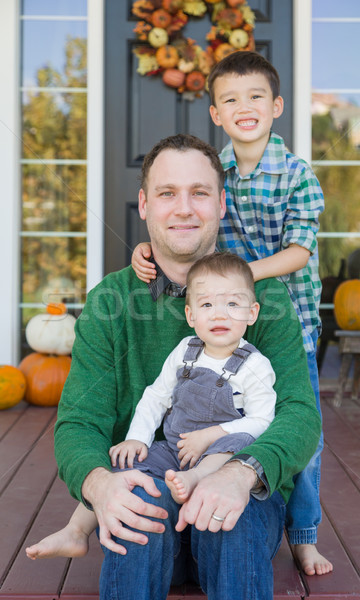 Young Mixed Race Chinese and Caucasian Father with His Sons Stock photo © feverpitch