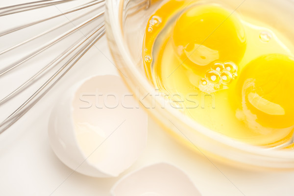 Mano mezclador huevos vidrio tazón Foto stock © feverpitch