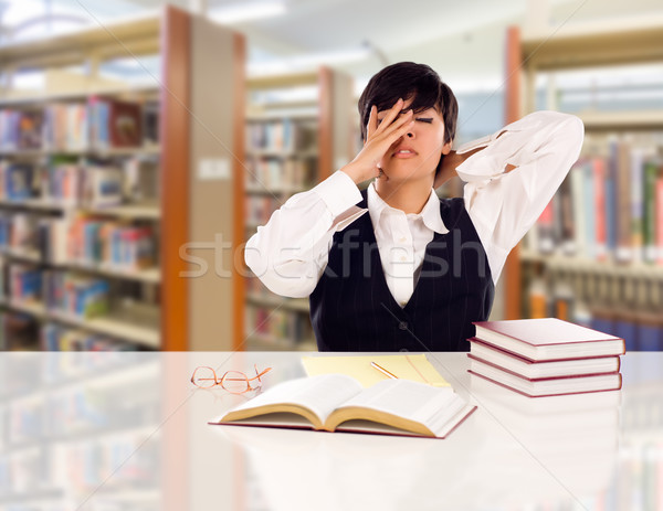Young Female Mixed Race Student Stressed and Frustrated In Libra Stock photo © feverpitch