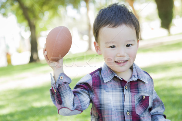[[stock_photo]]: Cute · jeunes · métis · garçon · jouer · football