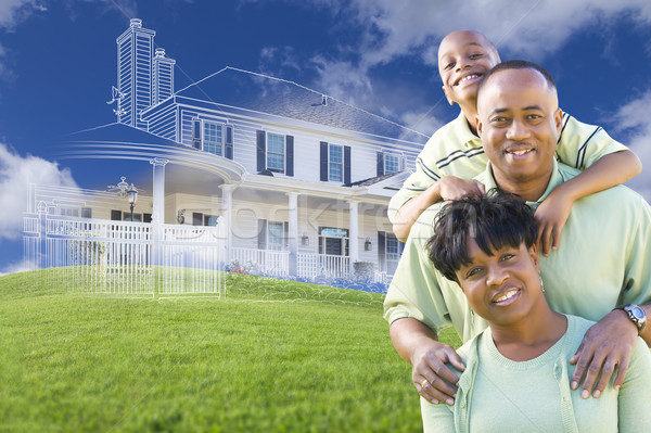 African American Family with Ghosted House Drawing Behind Stock photo © feverpitch