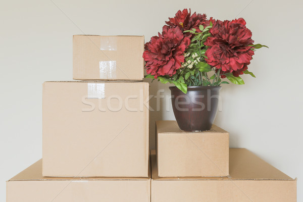Stock photo: Variety of Packed Moving Boxes In Empty Room