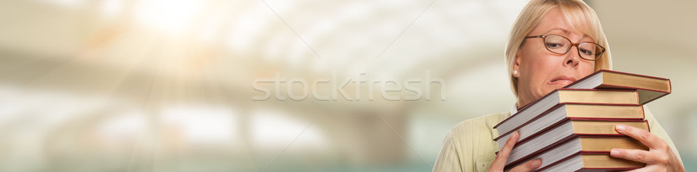 Banner of Beautiful Expressive Student or Businesswoman with Boo Stock photo © feverpitch