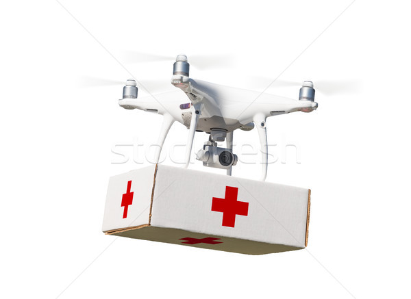 Unmanned Aircraft System (UAS) Quadcopter Drone Carrying First A Stock photo © feverpitch