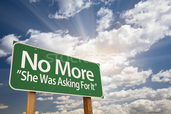Stock photo: No More - She Was Asking For It Green Road Sign