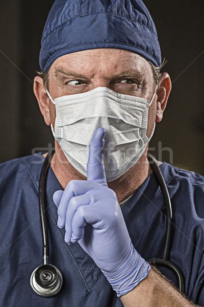 Secretive Doctor Wearing Protective Head Wear Stock photo © feverpitch