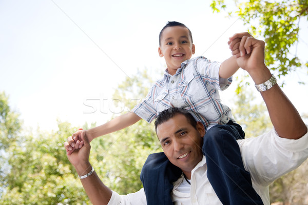 Hispanic Father and Son Having Fun in the Park Stock photo © feverpitch