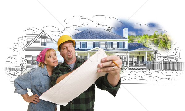Woman with Contractor Over House Drawing and Photo on White Stock photo © feverpitch
