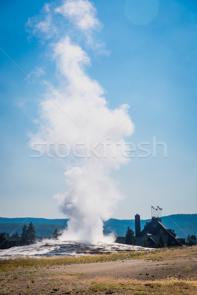 Stock photo: Old Faithful Geyser Erupting at Yellowstone National Park.