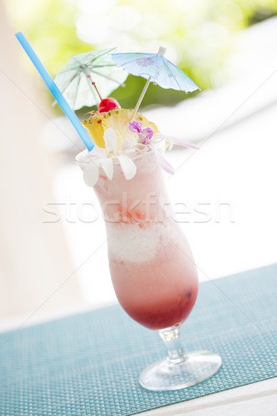 Fruity Tropical Drink with Pineapple and Umbrullas Stock photo © feverpitch