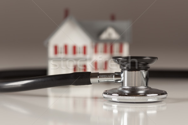 Stethoscope with Small Model Home Stock photo © feverpitch