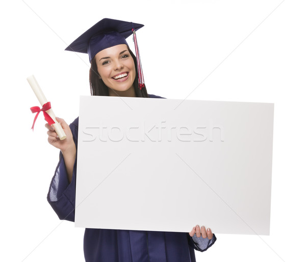 Female Graduate in Cap and Gown Holding Blank Sign, Diploma Stock photo © feverpitch
