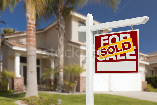 Sold Home For Sale Sign in Front of New House Stock photo © feverpitch