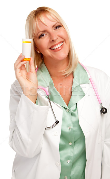 Attractive Female Doctor with Blank Prescription Bottle Stock photo © feverpitch