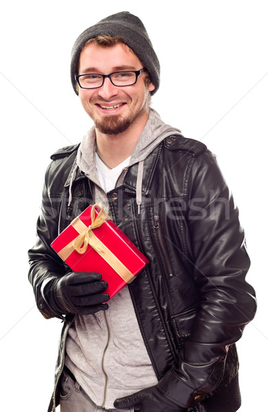 Warmly Dressed Handsome Young Adult Holding Gift Stock photo © feverpitch
