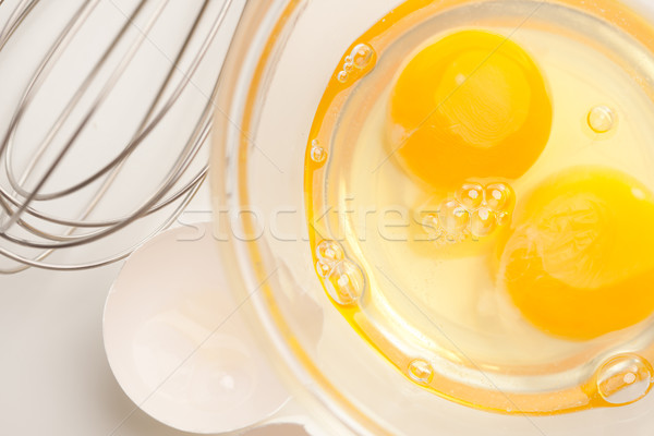 Foto stock: Mano · mezclador · huevos · vidrio · tazón