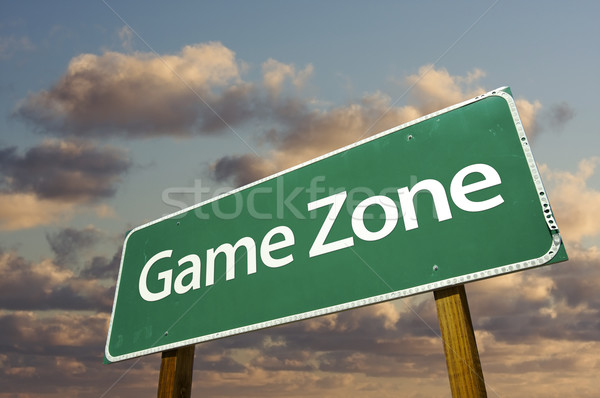 Game Zone Green Road Sign and Clouds Stock photo © feverpitch