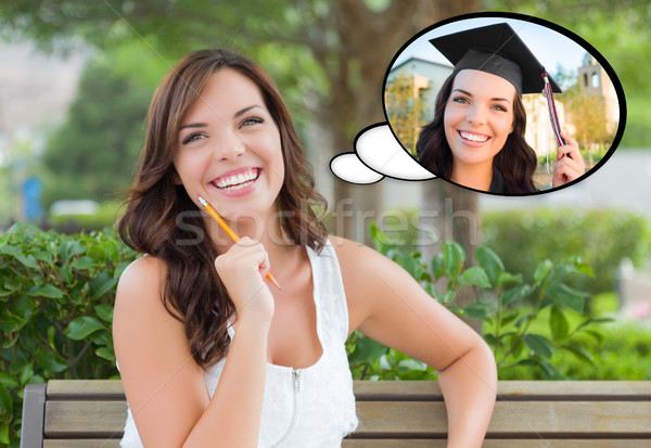 Stock photo: Thoughtful Young Woman with Herself as a Graduate Inside Thought