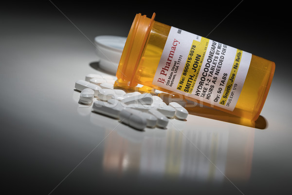 Hydrocodone Pills and Prescription Bottle with Non Proprietary L Stock photo © feverpitch