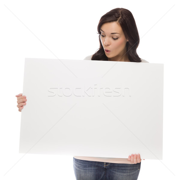Mixed Race Female Holding Blank Sign on White
 Stock photo © feverpitch