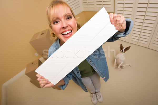 Stock photo: Woman and Doggy with Blank Sign Near Moving Boxes