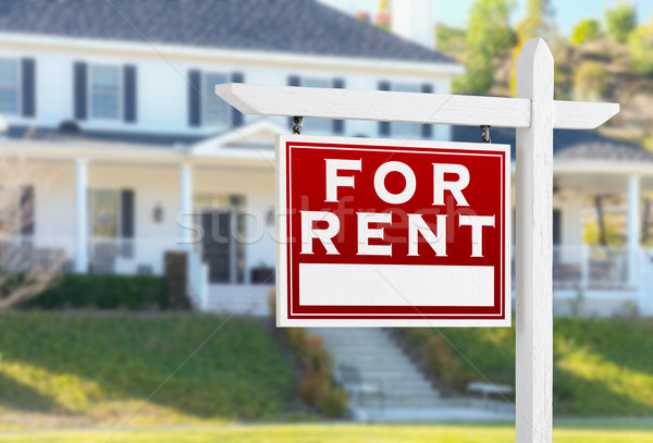 Left Facing For Rent Real Estate Sign In Front of House. Stock photo © feverpitch