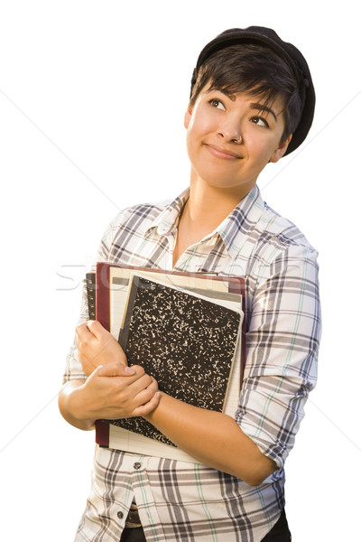 Portrait of Mixed Race Female Student Holding Books Isolated Stock photo © feverpitch