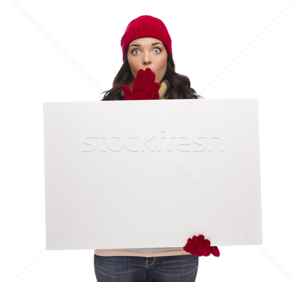 Stunned Girl Wearing Winter Hat and Gloves Holds Blank Sign  Stock photo © feverpitch