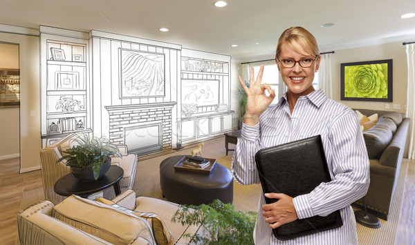 Stock photo: Woman with Okay Sign Over Custom Room and Design Drawing