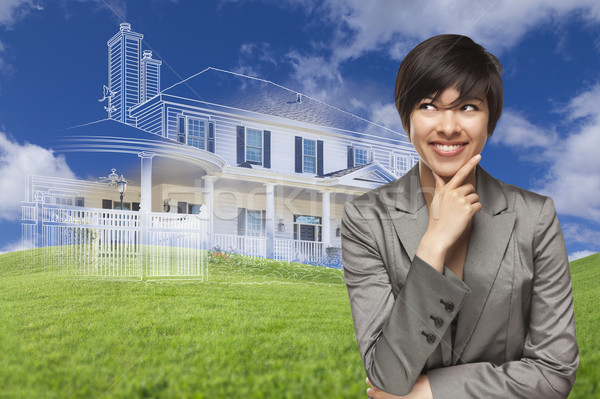 Mixed Race Woman Looks to Ghosted House Drawing Behind Stock photo © feverpitch