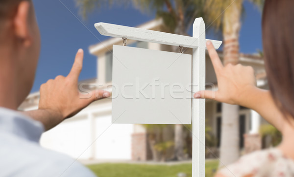 Blank Real Estate Sign, House and Military Couple Framing Hands Stock photo © feverpitch