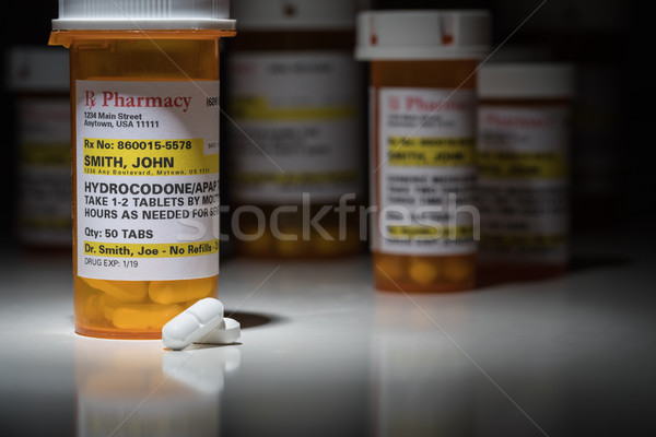 Stock photo: Hydrocodone Pills and Prescription Bottles with Non Proprietary 