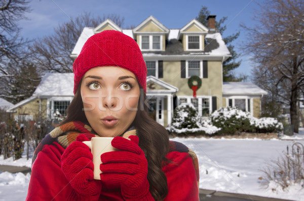 Woman in Winter Clothing Holding Mug Outside in Snow Stock photo © feverpitch