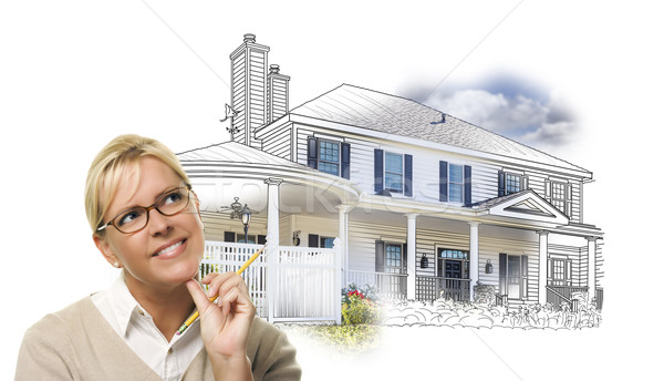 Woman with Pencil Over House Drawing and Photo on White Stock photo © feverpitch