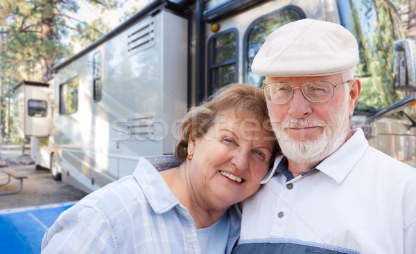 Senior Couple In Front of Their Beautiful RV At The Campground. Stock photo © feverpitch