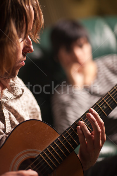 Jovem músico violão amigo luz metal Foto stock © feverpitch