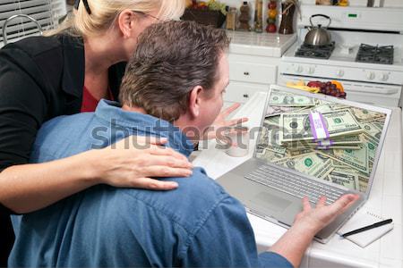 Couple In Kitchen Using Laptop - Oops! Sign Stock photo © feverpitch