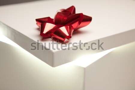 Red Bow Gift Box Lid Showing Very Bright Contents Stock photo © feverpitch