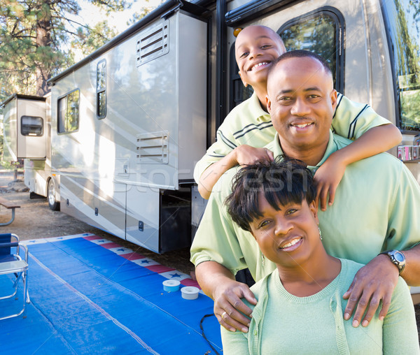 Happy African American Family In Front of Their Beautiful RV At  Stock photo © feverpitch
