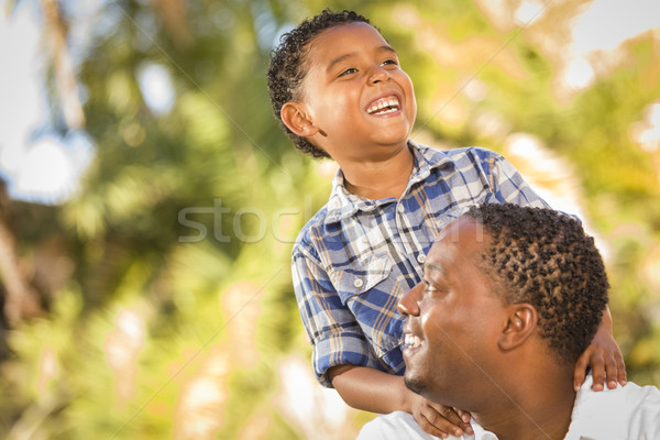 Stock photo: Happy Mixed Race Father and Son Playing