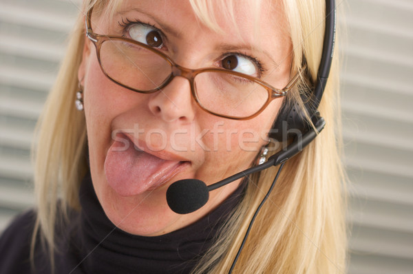 Attractive Businesswoman with Phone Headset Stock photo © feverpitch