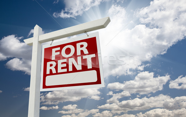 Stock photo: Right Facing For Rent Real Estate Sign Over Sunny Sky
