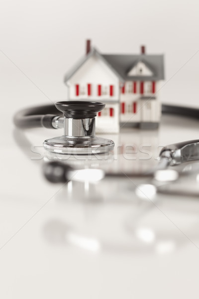Stethoscope with Small Model Home Stock photo © feverpitch