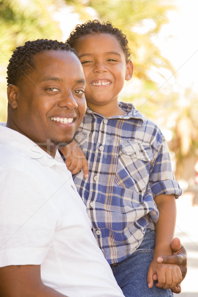 Happy Mixed Race Father and Son Playing Stock photo © feverpitch