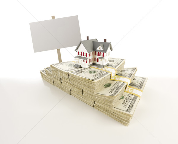Small House on Stacks of Hundred Dollar Bills and Blank Sign Stock photo © feverpitch