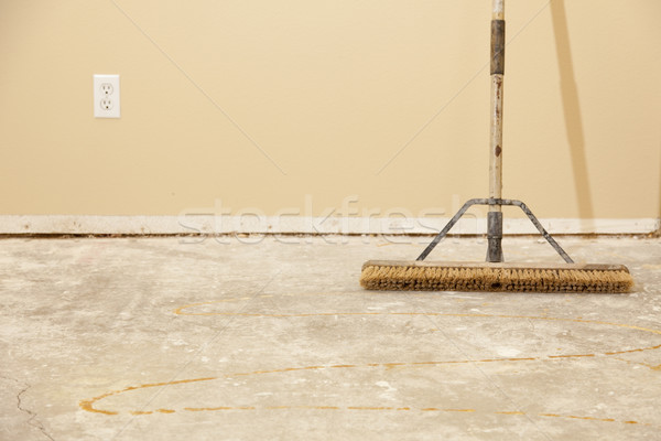 Concrete House Floor with Broom Ready for Flooring Installation Stock photo © feverpitch