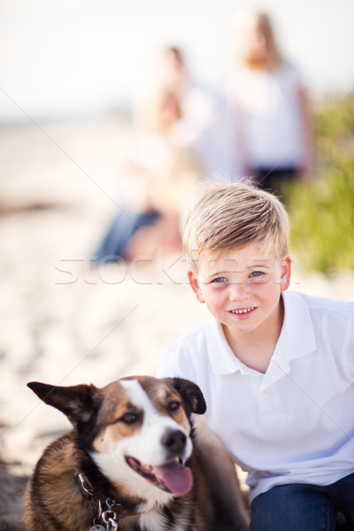 Handsome Young Boy Playing with His Dog Stock photo © feverpitch