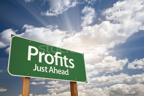 Profits Green Road Sign Over Clouds Stock photo © feverpitch