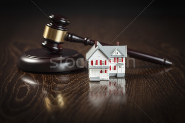 Gavel and Small Model House on Table Stock photo © feverpitch